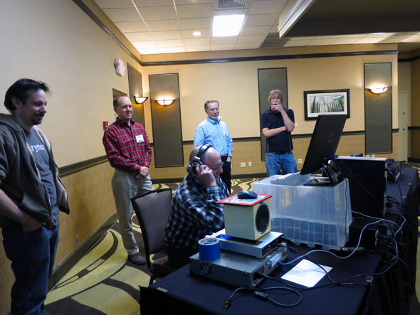 Digital attendee listens to the demo