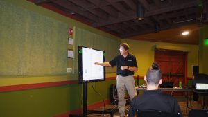 Pat teaching at a private seminar